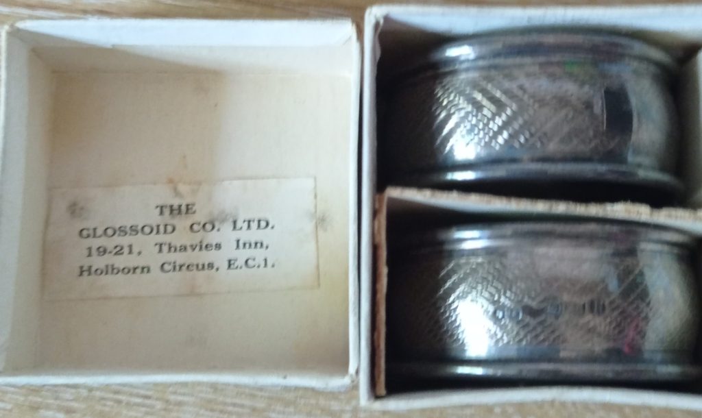 The box is now open and the retailer / manufacturer, Glossoid Ltd can be seen together with the two rings in the other half of the box.